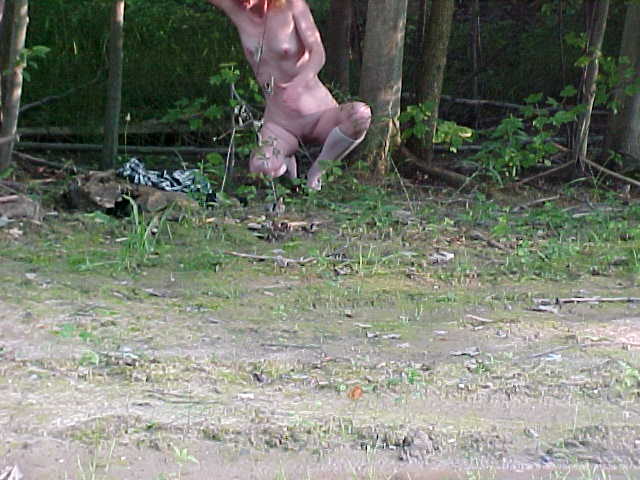 Stripping In The Woods - Sexy woman stripping in the woods getting completely naked